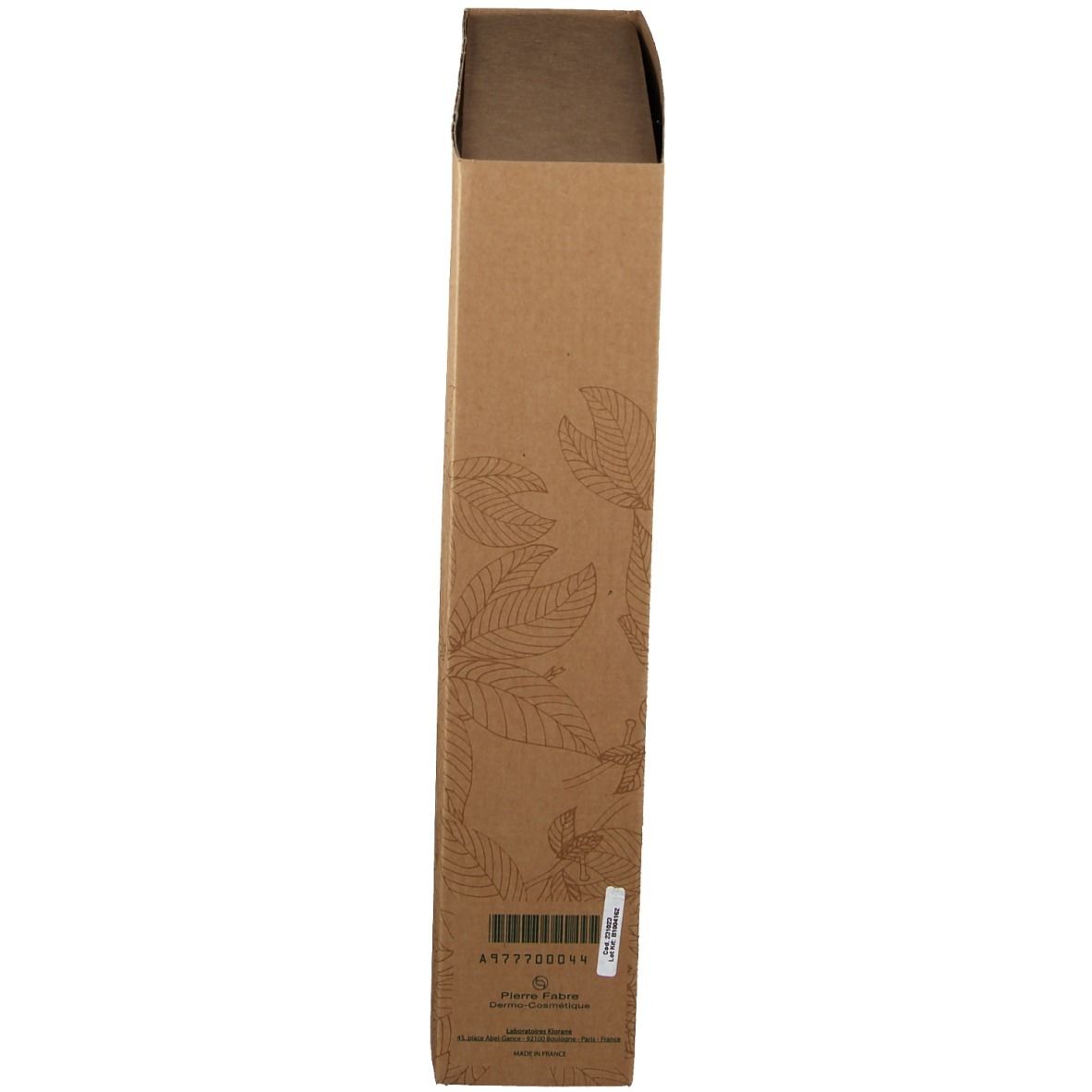 Emballage marron, allongé, avec motif de feuilles. Autocollant avec code-barres et informations produit.