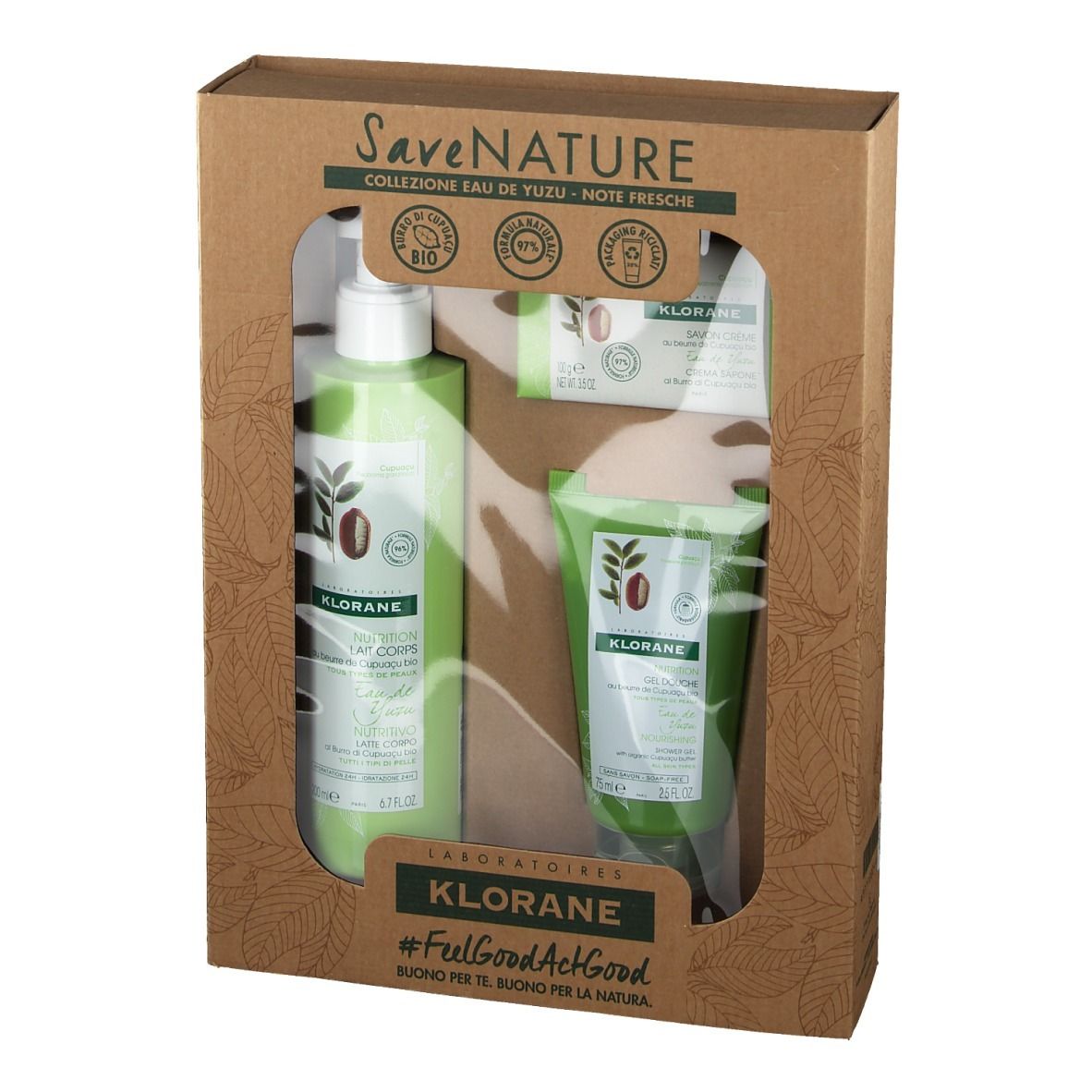 Coffret cadeau avec lotion, gel douche et savon. Flacons et tube verts dans un emballage marron.