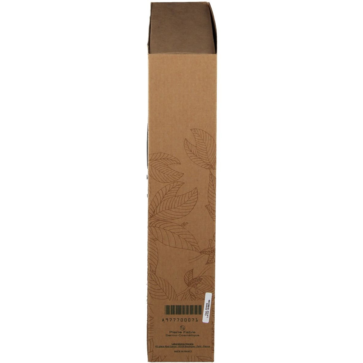 Emballage marron, allongé, avec un motif floral. Un code-barres et des informations sur le produit sont sur le côté.