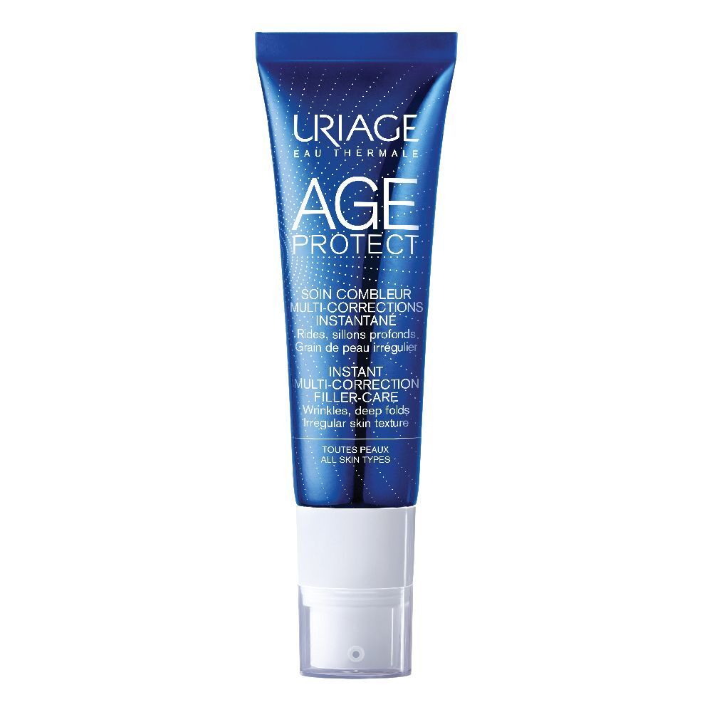 Tube bleu avec applicateur blanc. Inscription: URIAGE, AGE PROTECT. Texte: SOIN COMBLEUR, MULTI-CORRECTIONS INSTANTANE.