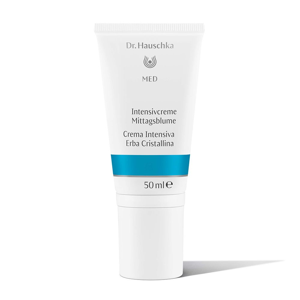 Tube blanche avec bande bleue. Inscription: Dr. Hauschka MED, Crème Intensive Mittagsblume, 50 ml.
