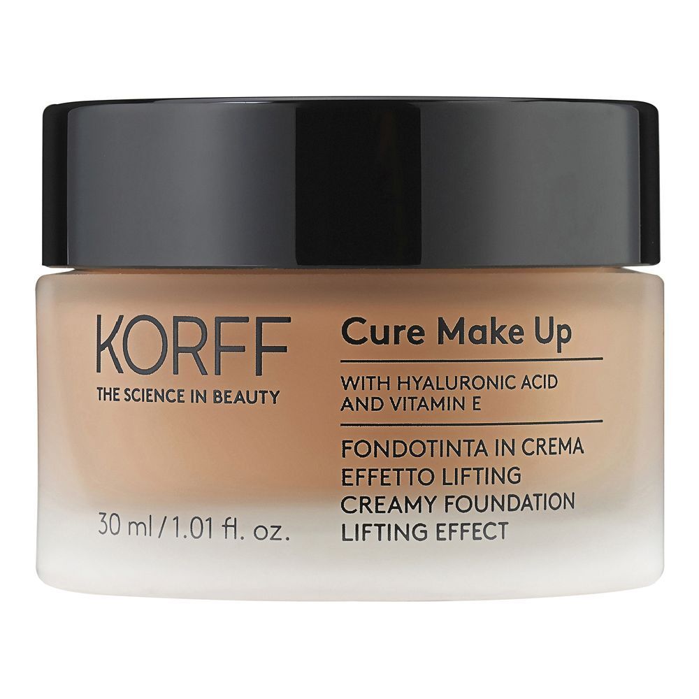 KORFF Cure Make Up Straffende Grundierung 06. Crème brune dans un pot en verre avec un couvercle noir. Contient de l'acide hyaluronique et de la vitamine E.