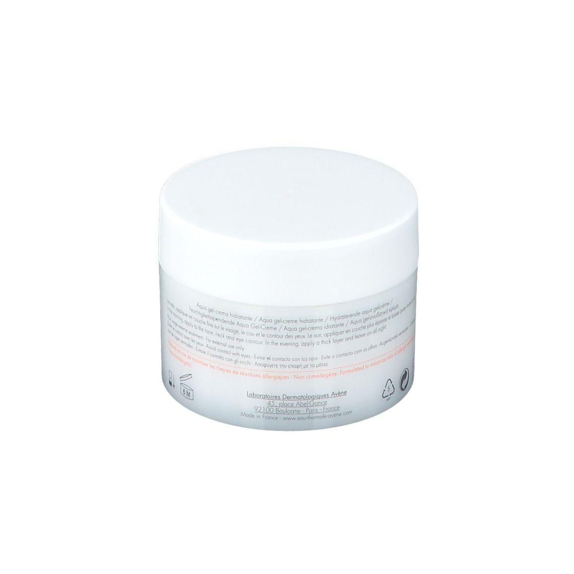 Pot blanc avec couvercle. Texte et symboles sur l'étiquette.