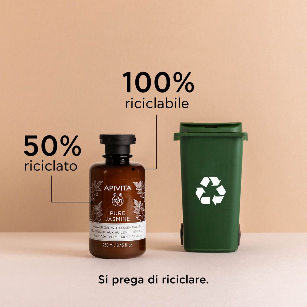 Flacon marron avec bouchon noir. Inscription: APIVITA Pure Jasmine Gel douche. 50% recyclé. Poubelle verte.