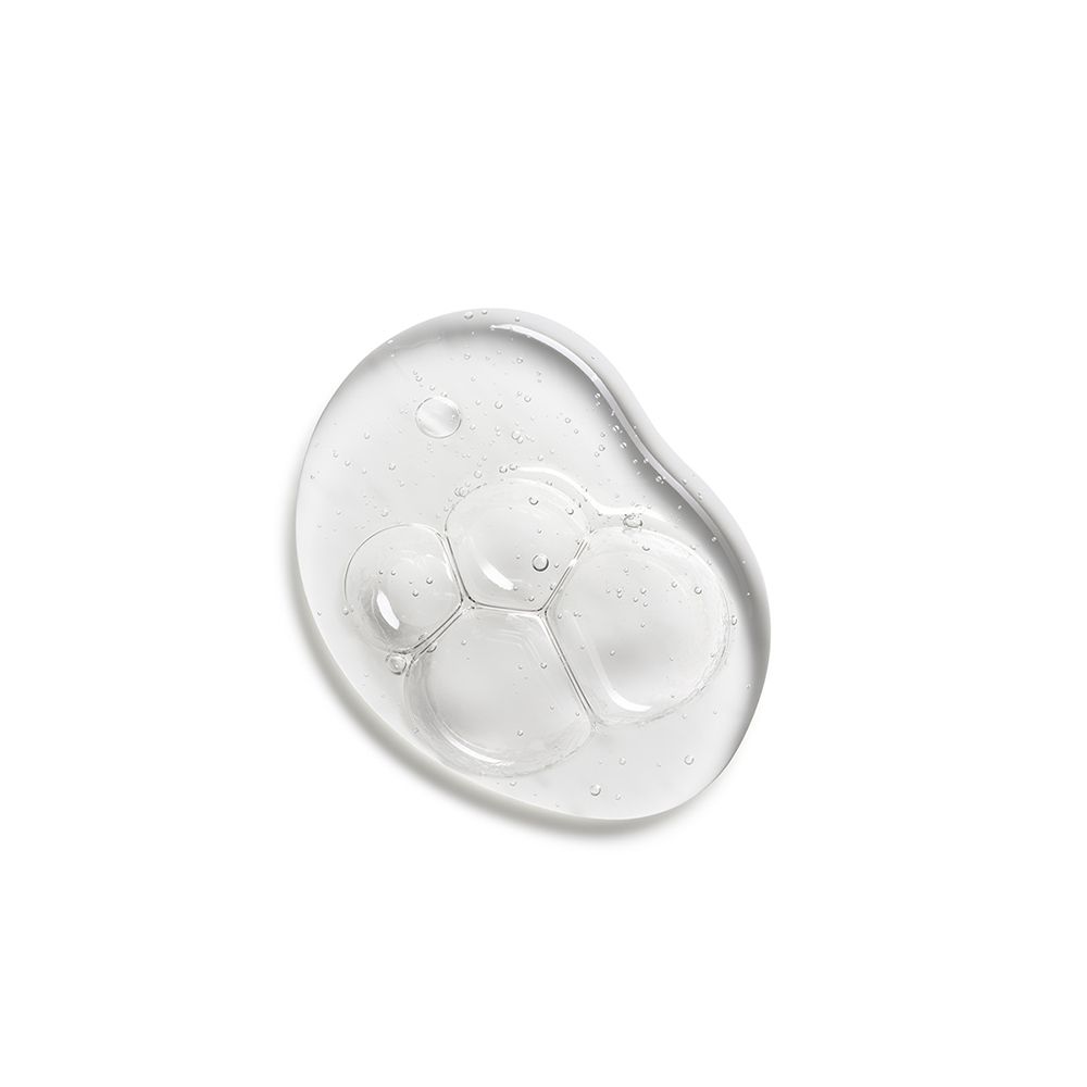 Échantillon de gel transparent avec bulles. Sur fond blanc.