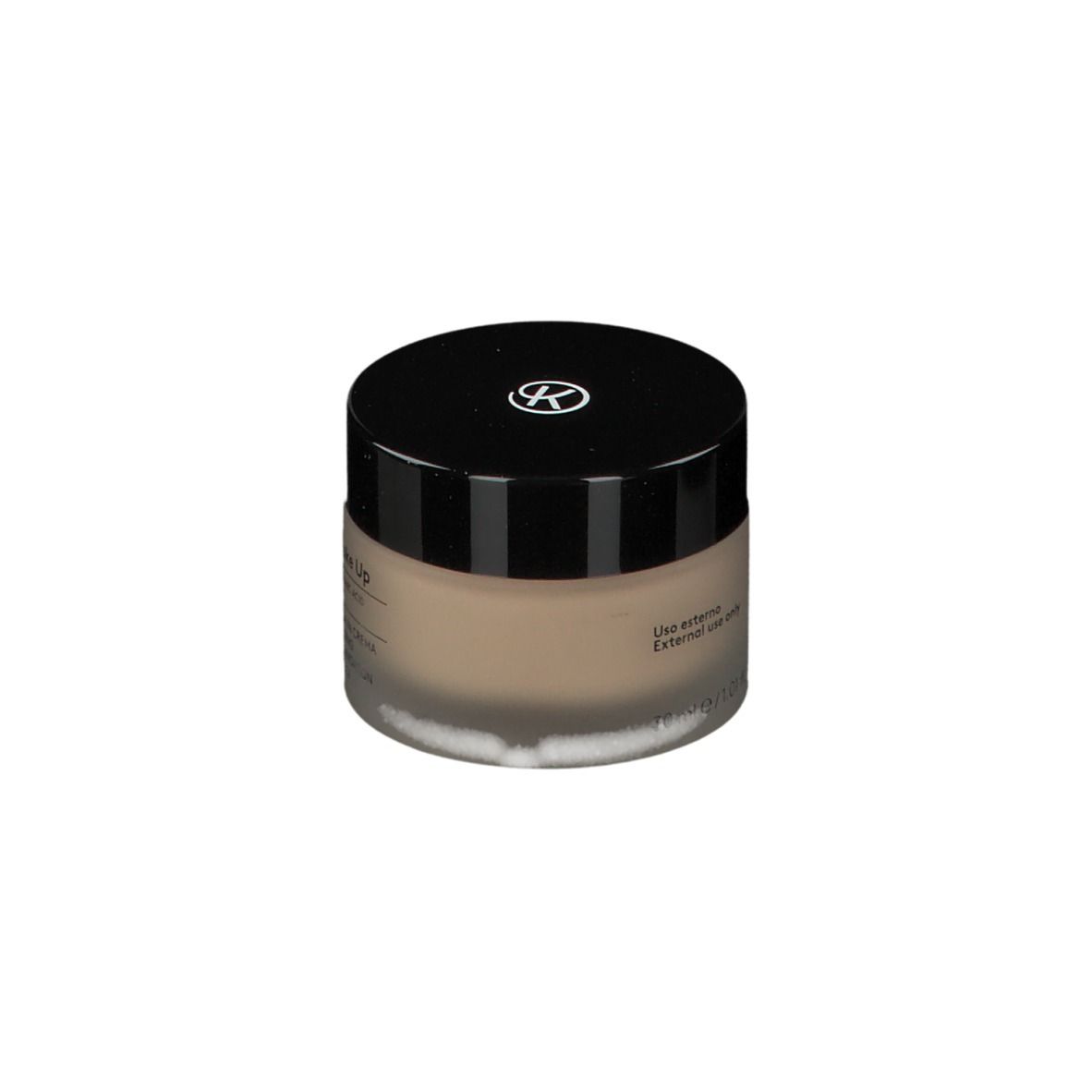 Runder Glasbehälter mit schwarzem Deckel. Enthält Creme-Foundation. Aufschrift: KORFF.