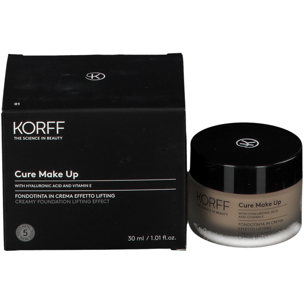Creme-Foundation und Verpackung. Schwarze Schachtel und runder Behälter. Aufschrift: KORFF, Cure Make Up.