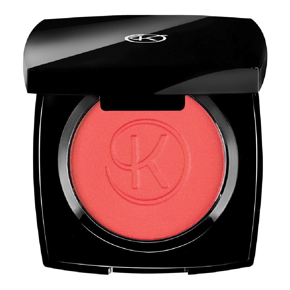 Fard à joues compact avec couvercle noir. Fard à joues rond, couleur corail. Logo 'K' en relief.