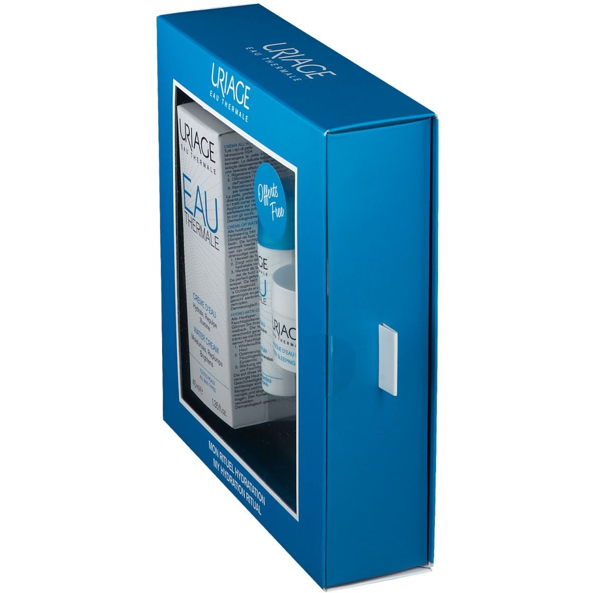 Blaue Geschenkbox mit Sichtfenster. Uriage-Produkte teilweise sichtbar. Aufdrucke und Logos auf der Verpackung.