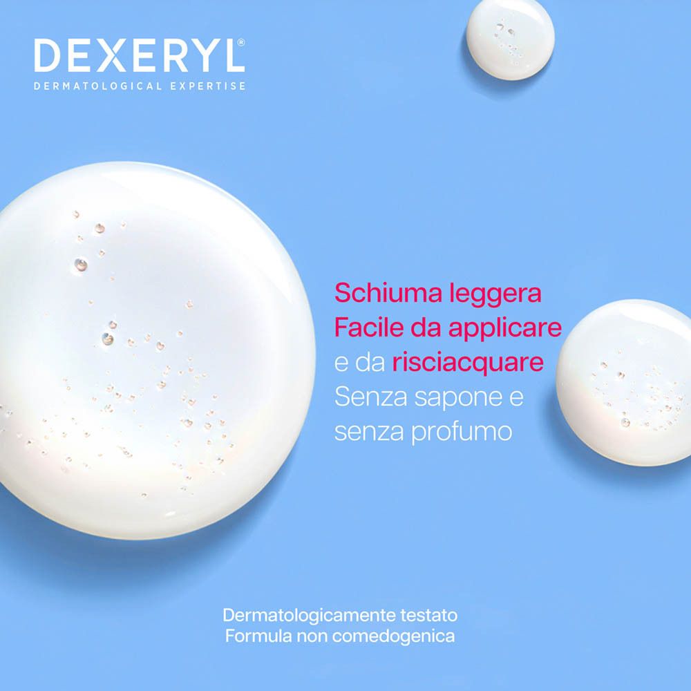 DEXERYL® Crème de douche, flacon blanc avec pompe. Texte: Crème de douche, Shower Cream. Mousse légère, facile à rincer.