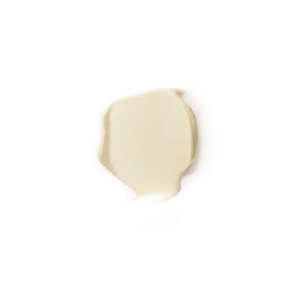 Tache de crème, jaune clair, sur fond blanc.