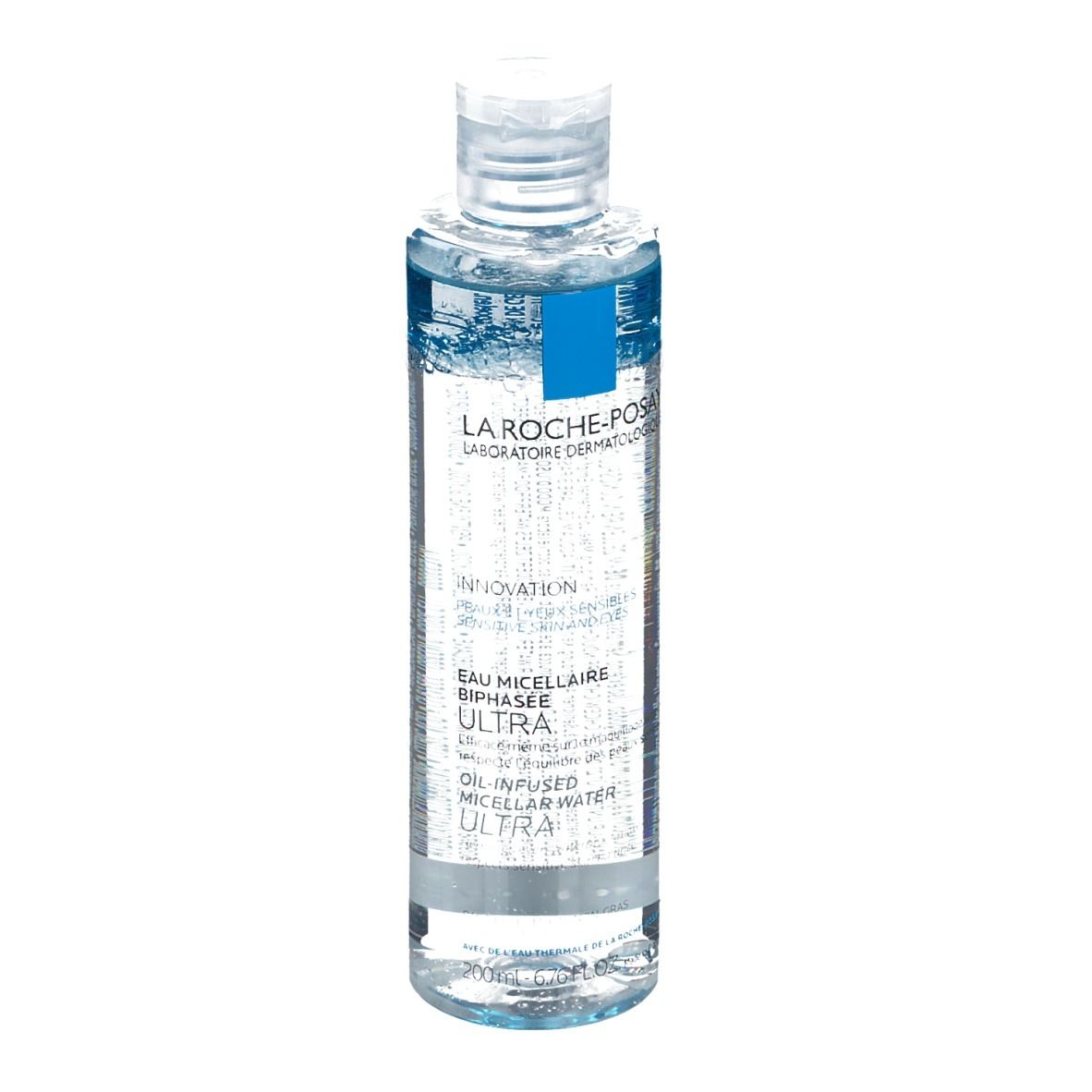 Klare Flasche mit blauem Etikett. Aufschrift: La Roche-Posay, Eau Micellaire Biphasée Ultra. Transparente Flüssigkeit sichtbar.
