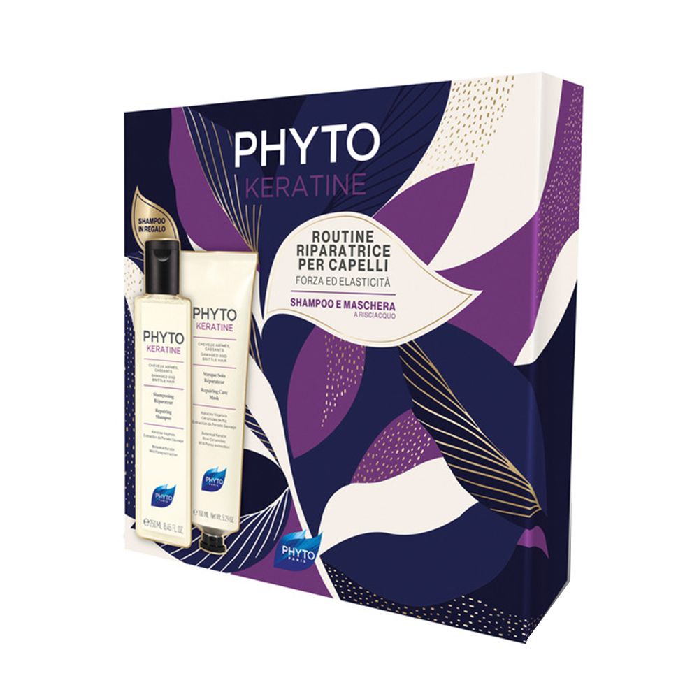 Geschenkbox mit Shampoo und Maske. Aufschrift: PHYTO KERATINE. Verpackung in Blau, Lila und Weiß.