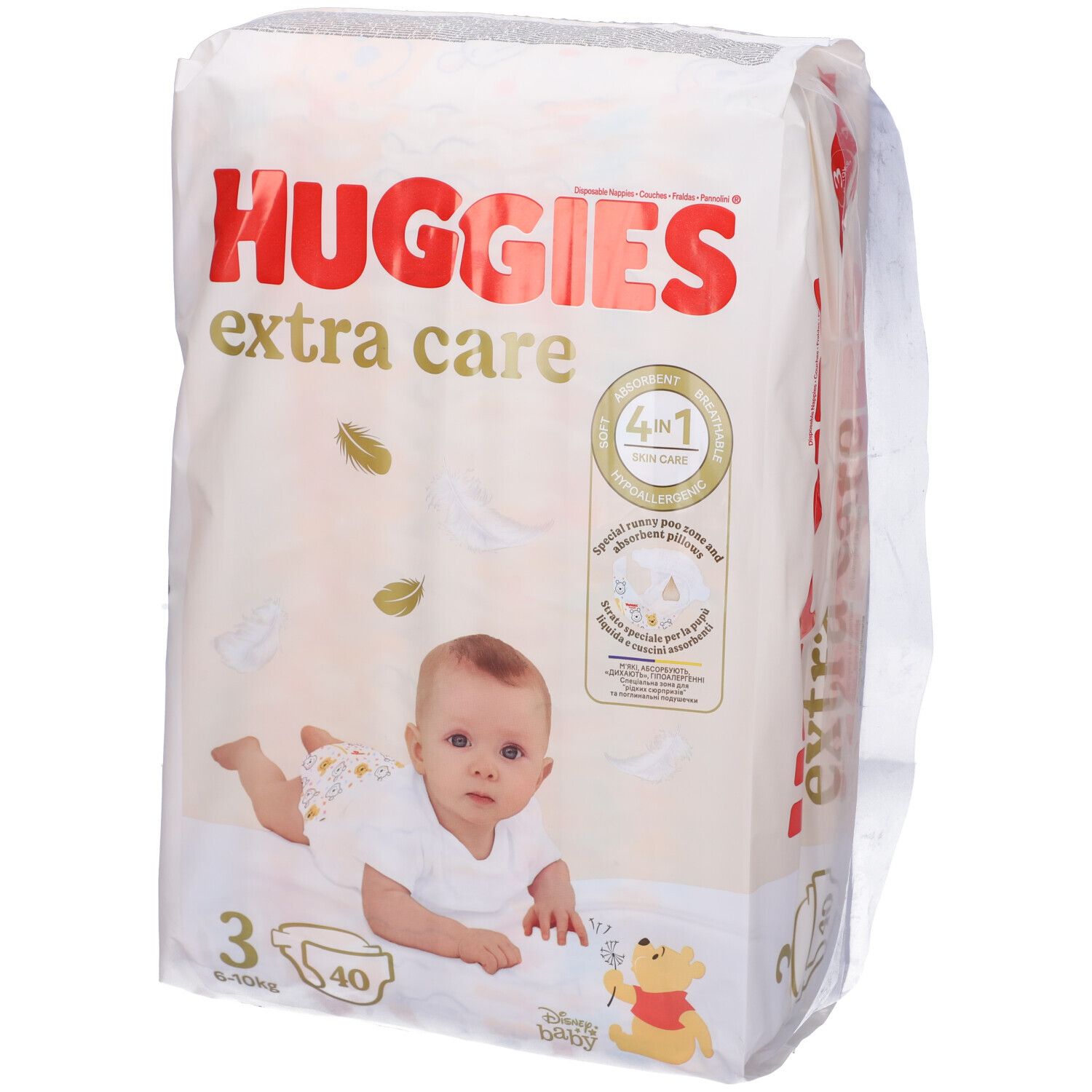 Paquet de couches Huggies Extra Care taille 3, 6-10 kg, 40 unités. Bébé et Winnie l'Ourson sur l'emballage.
