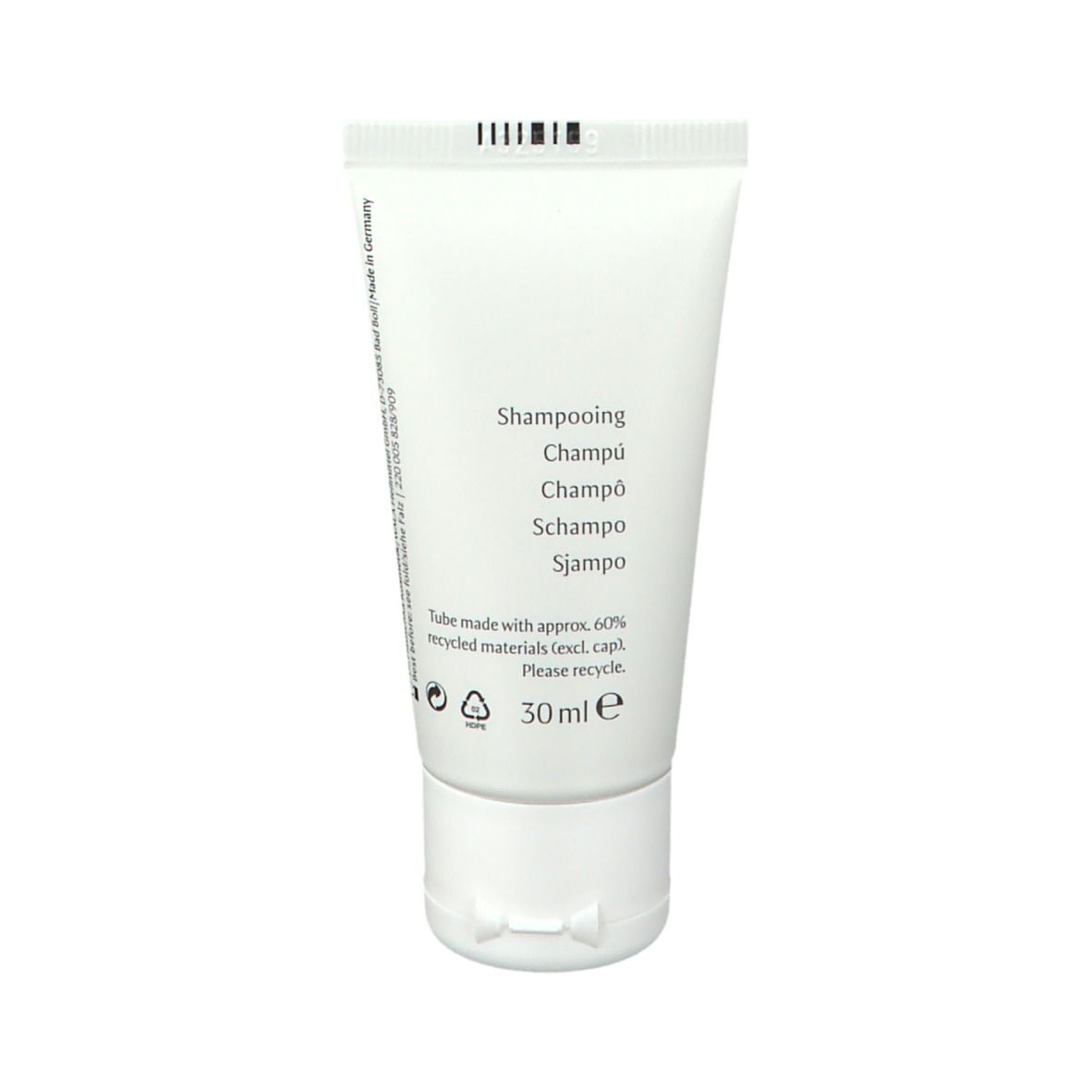Weiße Tube mit lila Band. Aufschrift: Shampoo, 30 ml. Text: Tube aus 60% recyceltem Material.