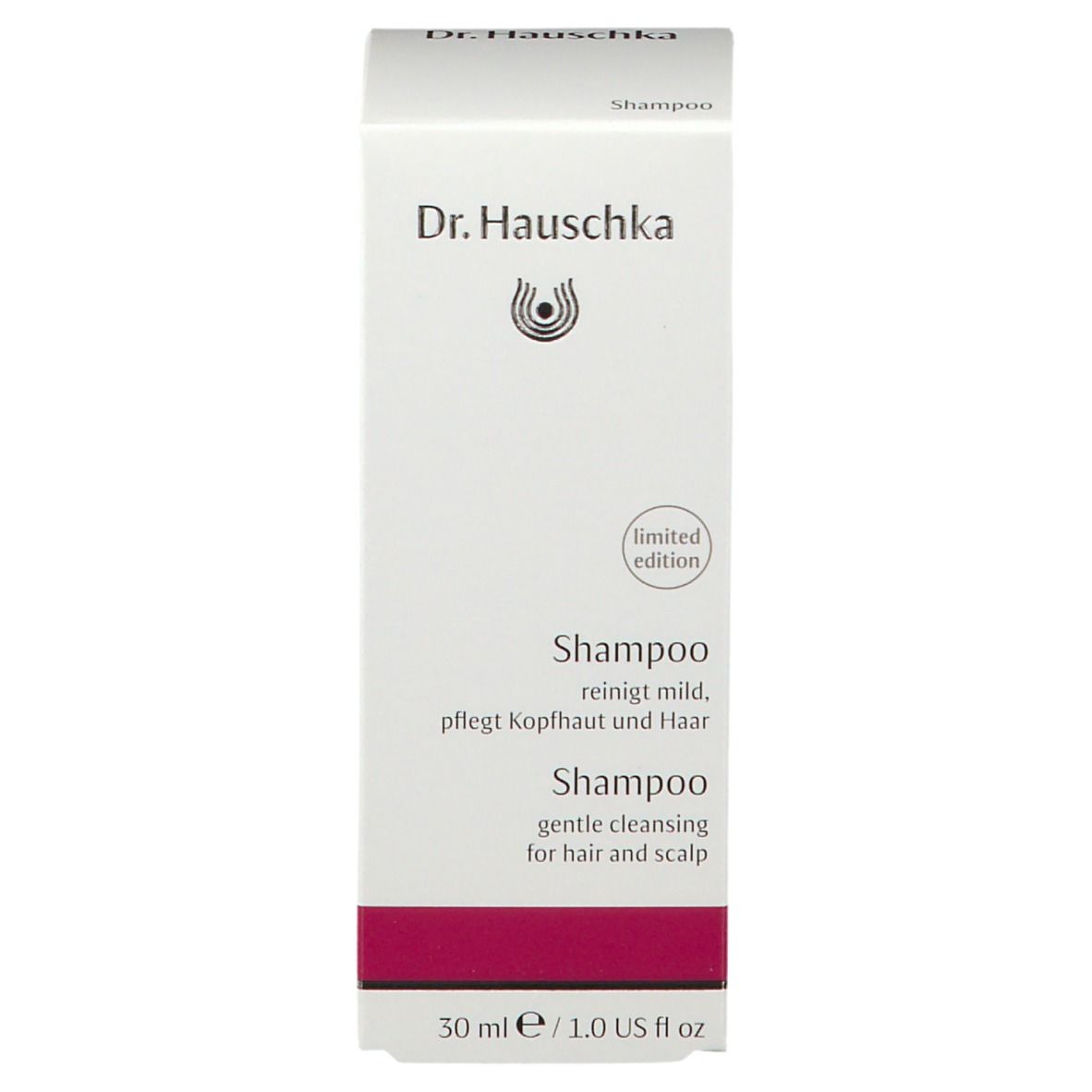 Weiße Schachtel. Aufschrift: Dr. Hauschka, Shampoo. Text: reinigt mild, pflegt Kopfhaut und Haar.