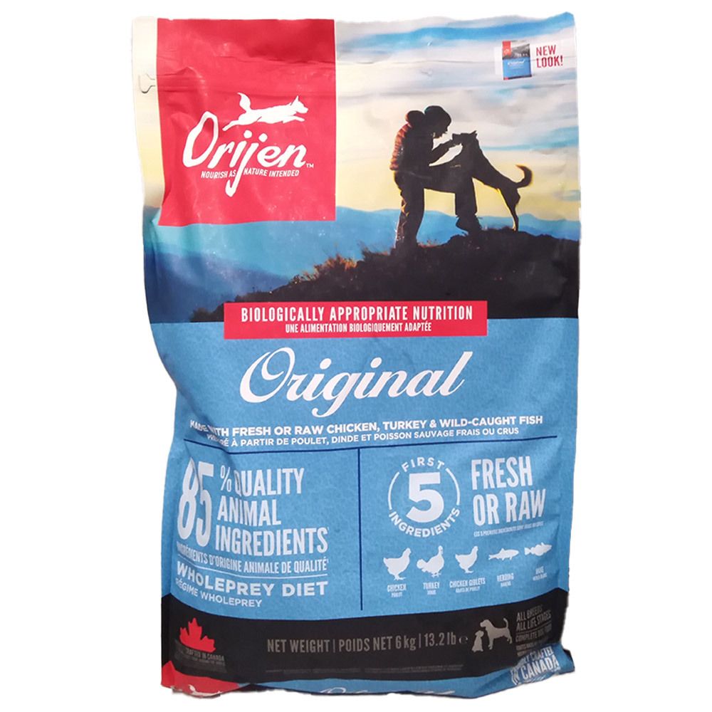 Orijen Original Hundefutter, 6 kg Beutel. Vorderseite mit Hund und Mensch auf einem Berg.