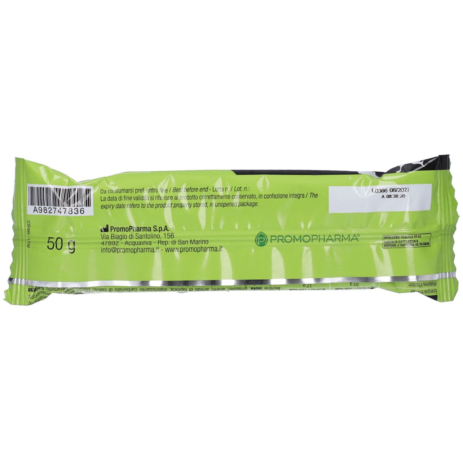 Rückseite der Proteinriegel-Verpackung. Grün-weiße Verpackung. Text und Barcode. 50 g.