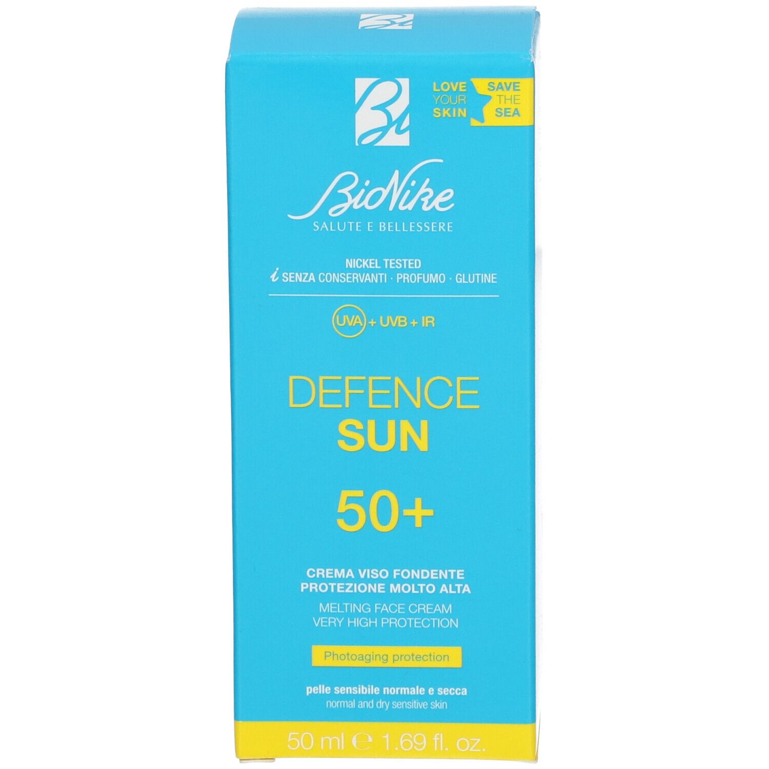 Boîte turquoise avec fond jaune. Inscription : Defence Sun 50+. Marque BioNike. Texte en italien.