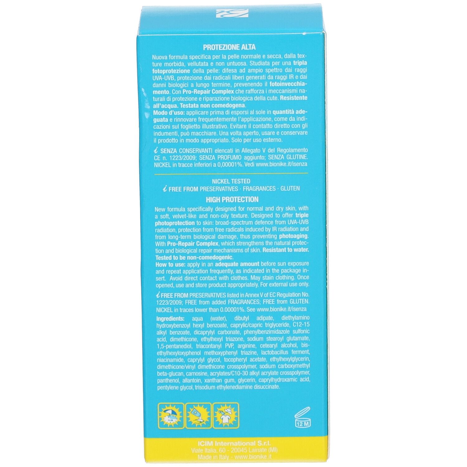 Dos de la boîte de crème solaire. Texte: Sans conservateurs, sans parfum, sans gluten. Ingrédients.