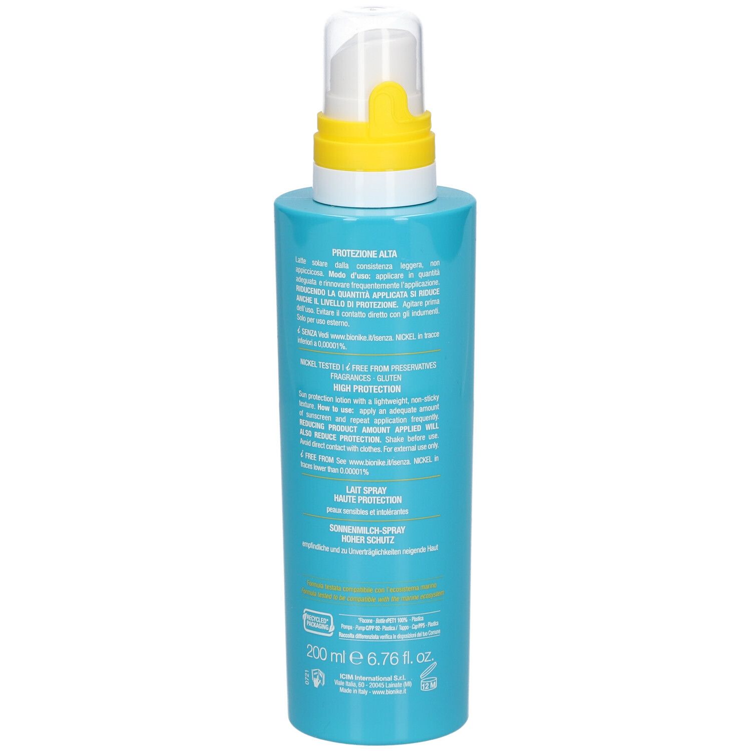 Flacon bleu turquoise avec vaporisateur blanc et anneau jaune. Inscription : Defence Sun 30, Bionike, 200 ml.