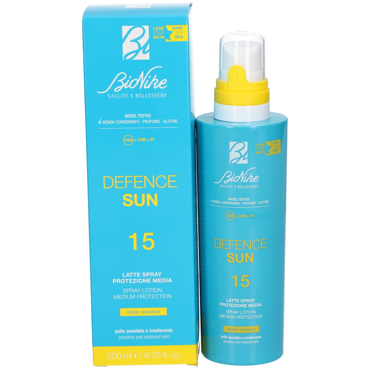 Flacon spray bleu turquoise et carton. Inscription : Defence Sun 15, Latte Spray, protection SPF 15. 200 ml.