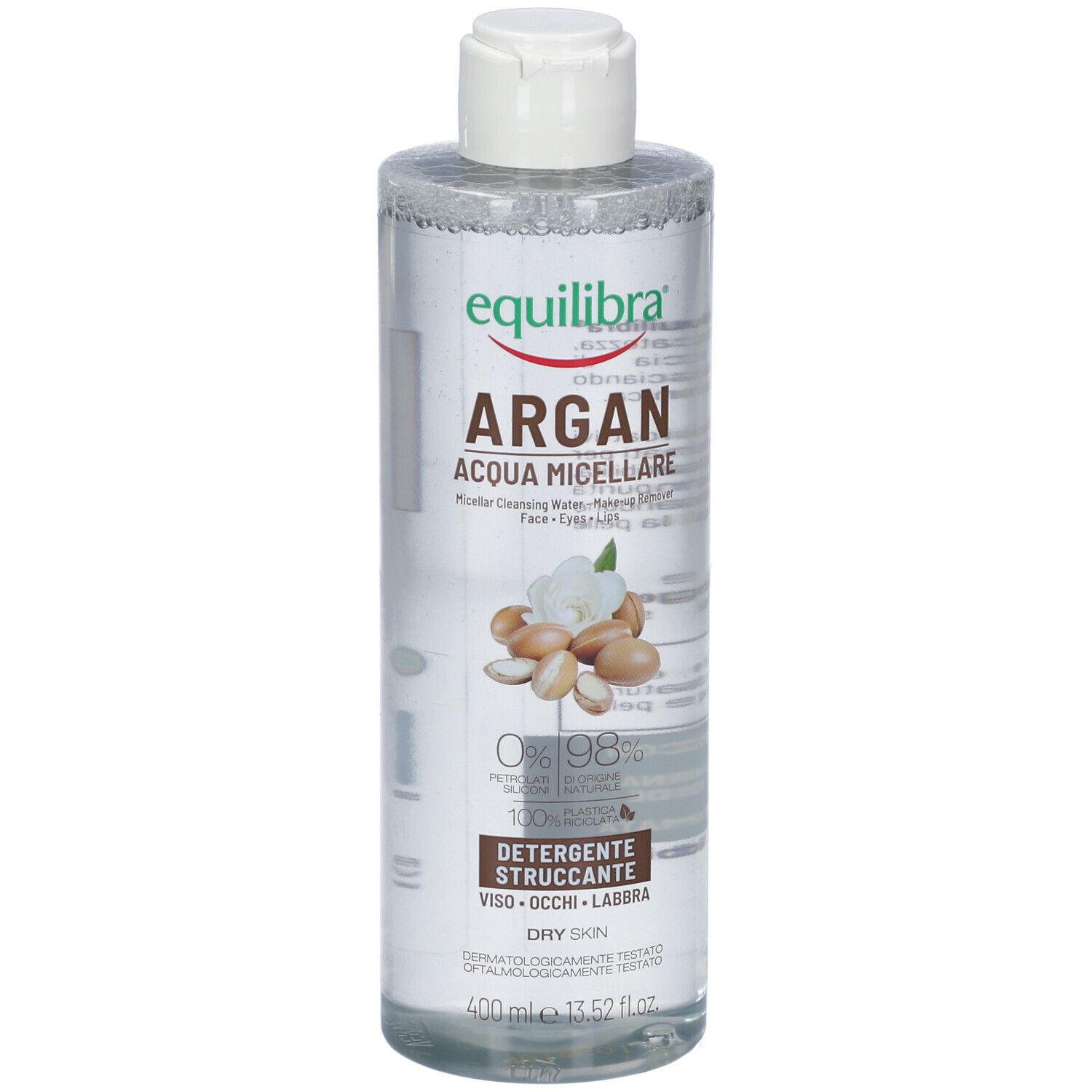 Flacon transparent avec bouchon blanc. Étiquette avec nom du produit, illustration d'argan et texte. Pour peau sèche.