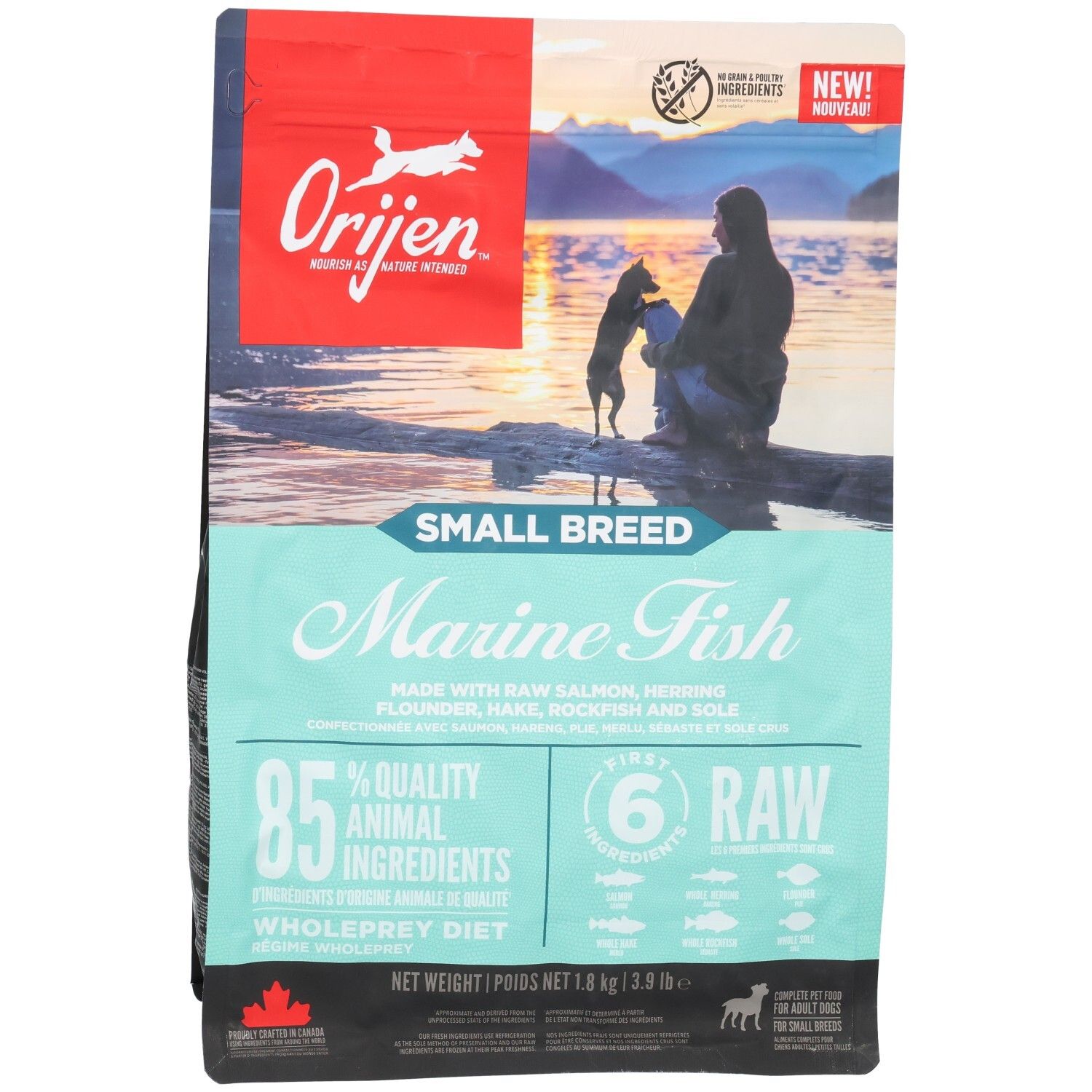 Hundefutterbeutel Orijen. Aufschrift: Marine Fish, Small Breed. Enthält 85% tierische Inhaltsstoffe. 1,8 kg. Abbildung: Frau und Hund.