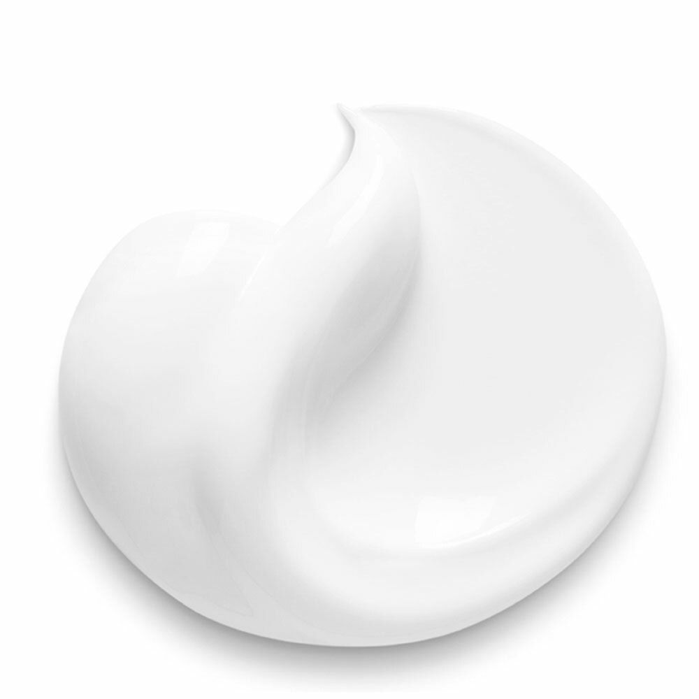 Gros plan d'une crème blanche. Forme lisse et bombée.