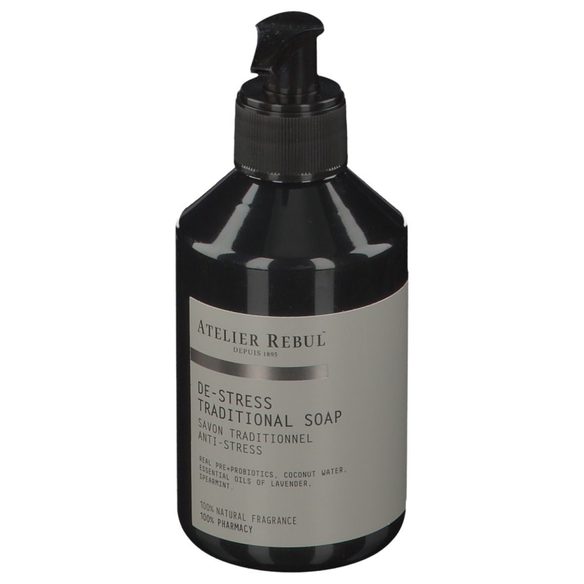 Flacon noir avec pompe. Inscription : ATELIER REBUL, DE-STRESS TRADITIONAL SOAP. Contient des huiles essentielles.