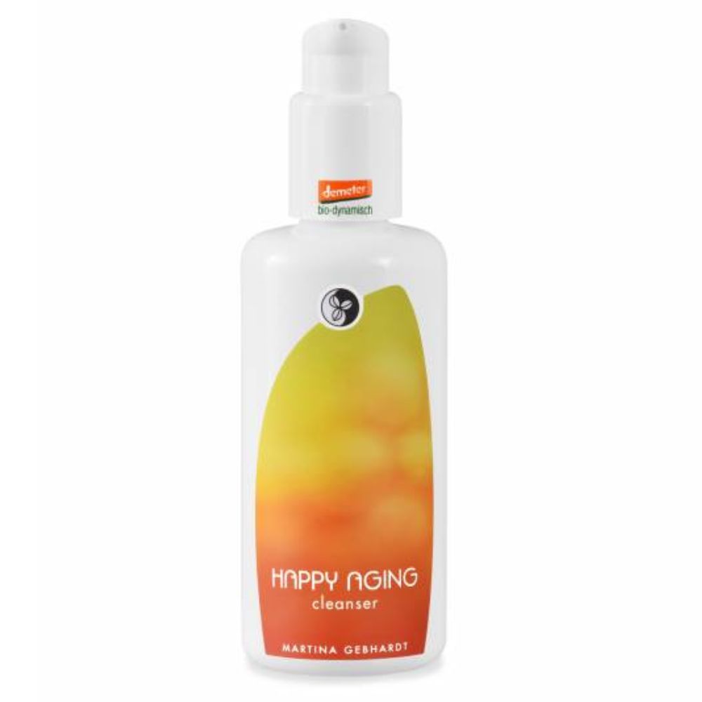 Flacon blanc avec pompe. Inscription HAPPY AGING cleanser et Martina Gebhardt. Dégradé jaune-orangé.