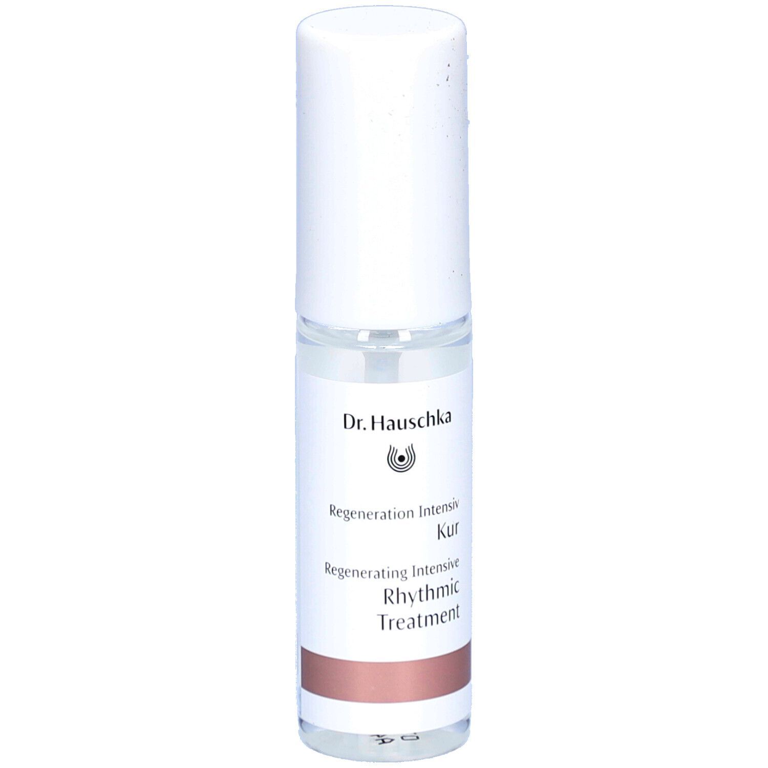 Flacon spray transparent avec bouchon blanc. Inscription: Dr. Hauschka, Regenerating Intensive Kur, Rhythmic Treatment.