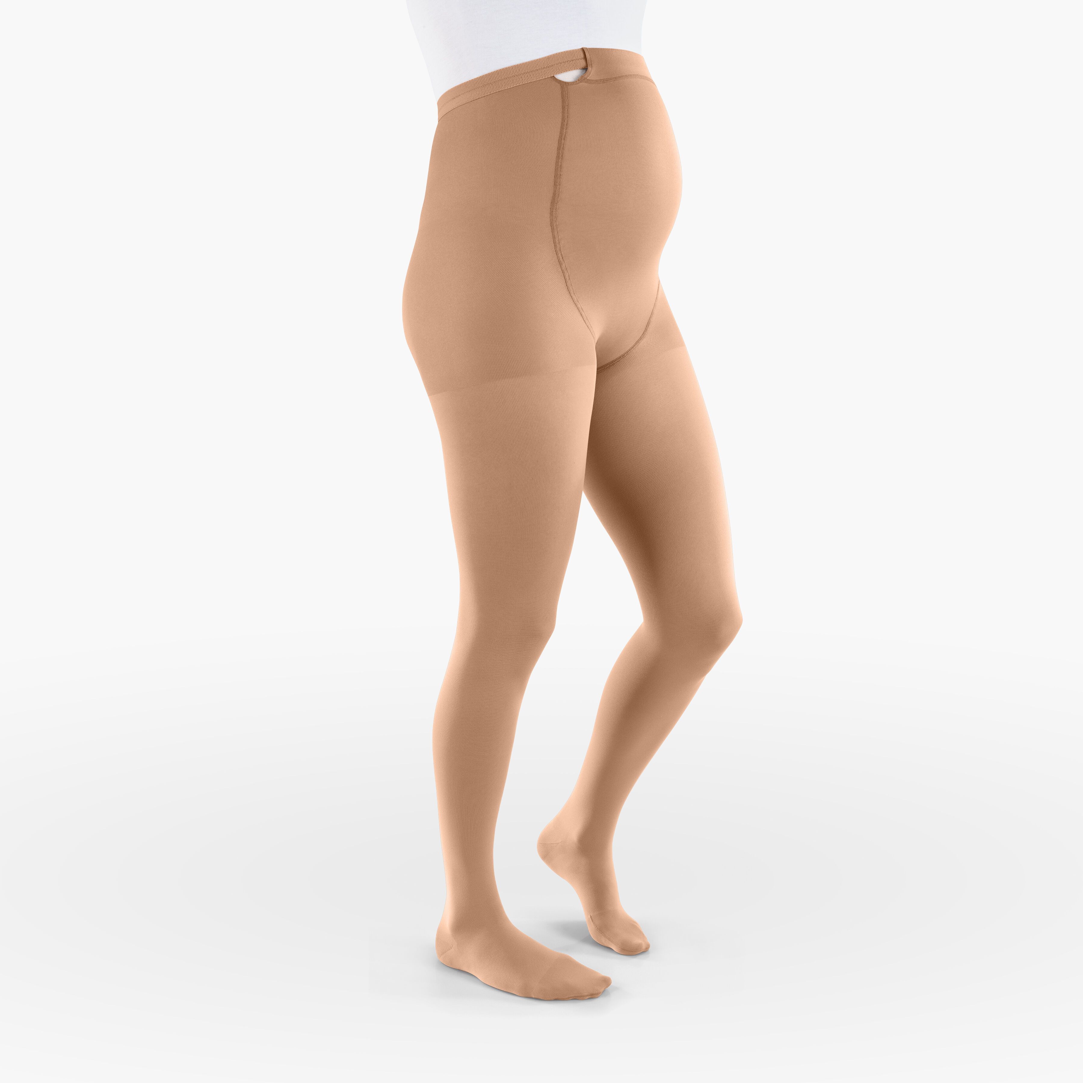 Collant de compression beige pour femmes enceintes. Vue latérale d'une personne portant le collant.
