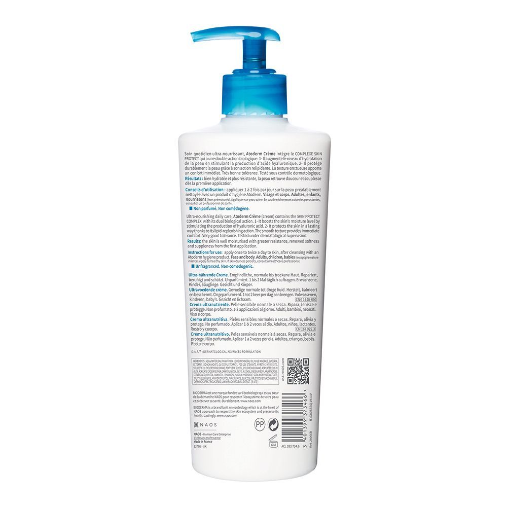 Flacon blanc avec pompe bleue. Texte: BIODERMA Atoderm Crème. Informations produit multilingues au dos.