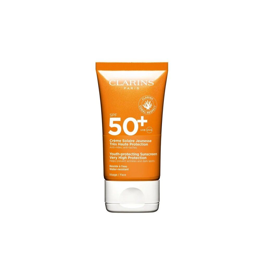 Crème solaire Clarins SPF 50+ pour le visage. Tube orange avec bouchon blanc.
