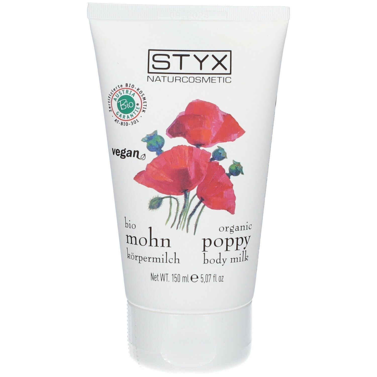 Weiße Tube mit STYX-Logo, Mohnblüten-Illustration und Text: bio mohn körpermilch, organic poppy body milk. Vegan-Siegel.