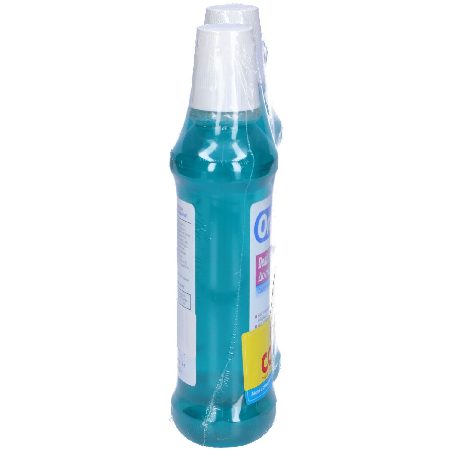 Deux flacons de bain de bouche emballés dans du film plastique. Vue latérale. Liquide turquoise, bouchon blanc, étiquette bleue. Inscription italienne.