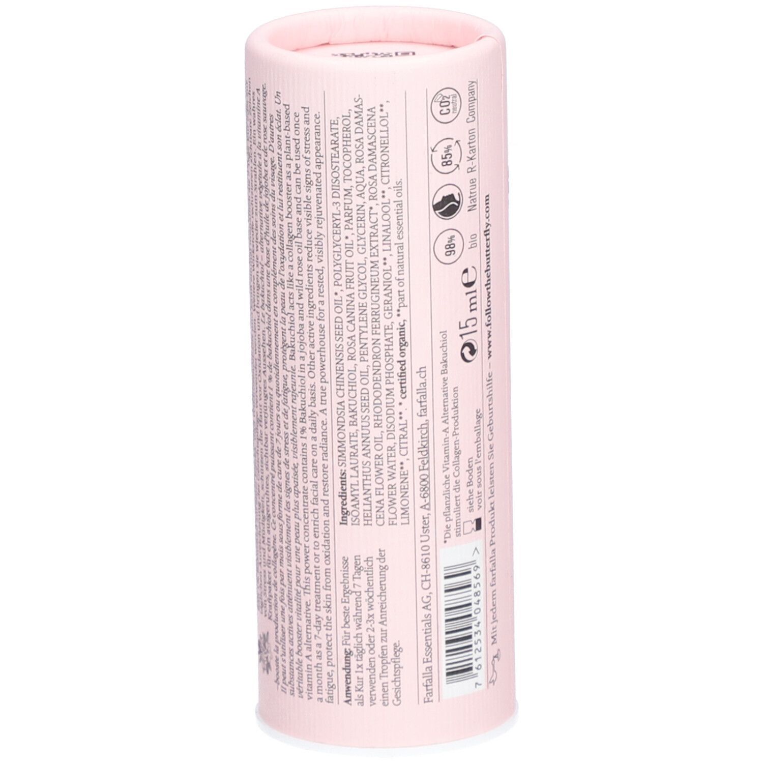 Rückseite der rosa zylindrischen Verpackung. Enthält Text, Inhaltsstoffe und Informationen zur Anwendung.