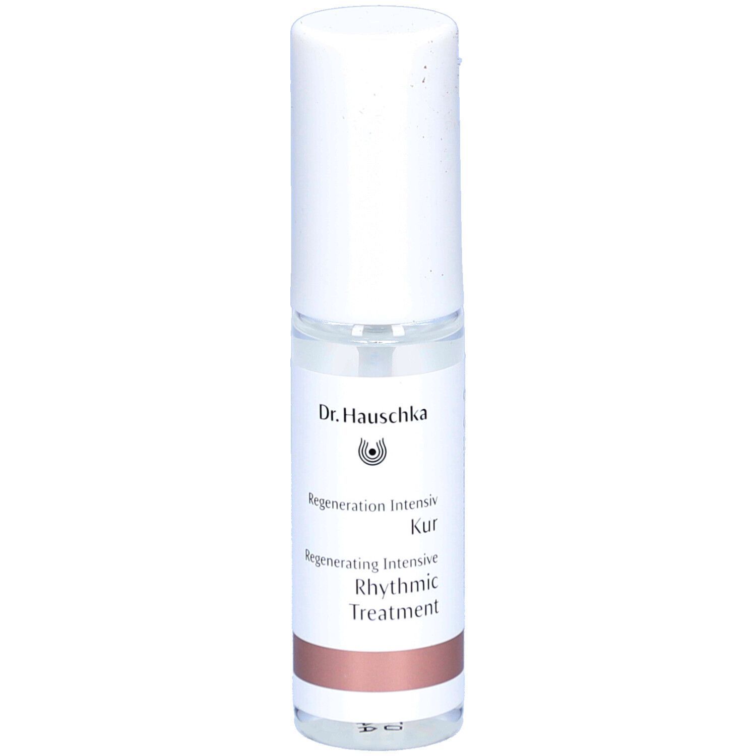 Flacon spray transparent avec bouchon blanc. Inscription: Dr. Hauschka, Regenerating Intensive Kur, Rhythmic Treatment.