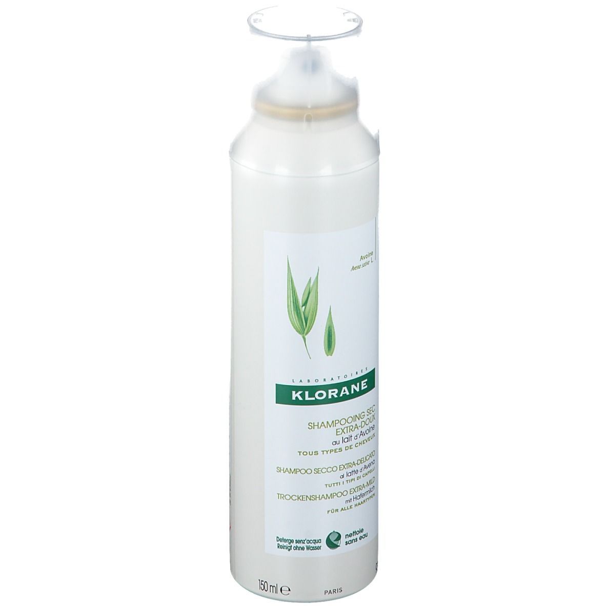 Spray blanc avec tête de pulvérisation. Étiquette avec logo et texte : KLORANE, Shampooing sec, lait d'avoine. 150ml.
