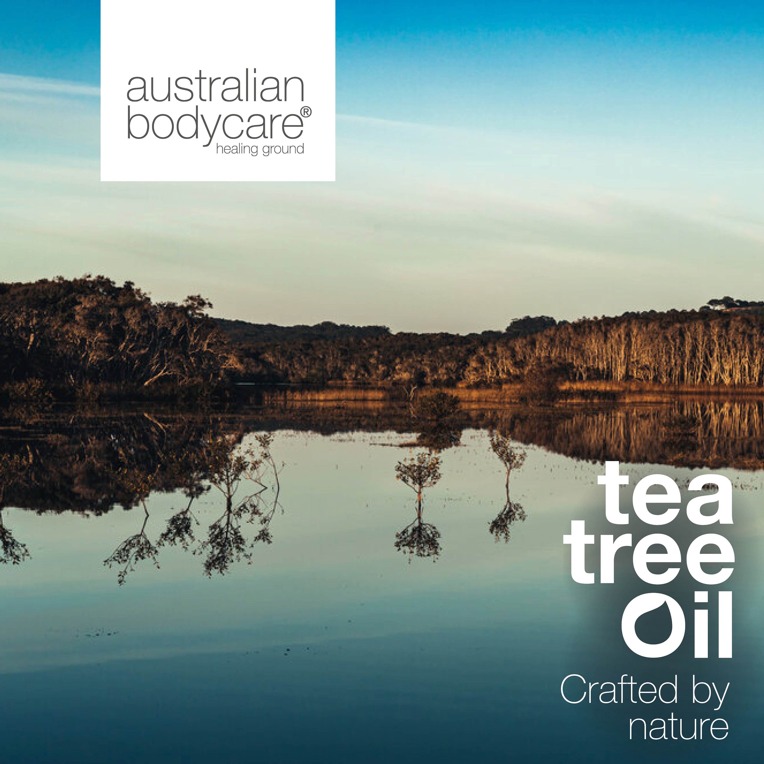 Paysage avec lac et texte : Tea Tree Oil, Crafted by nature, Australian Bodycare.