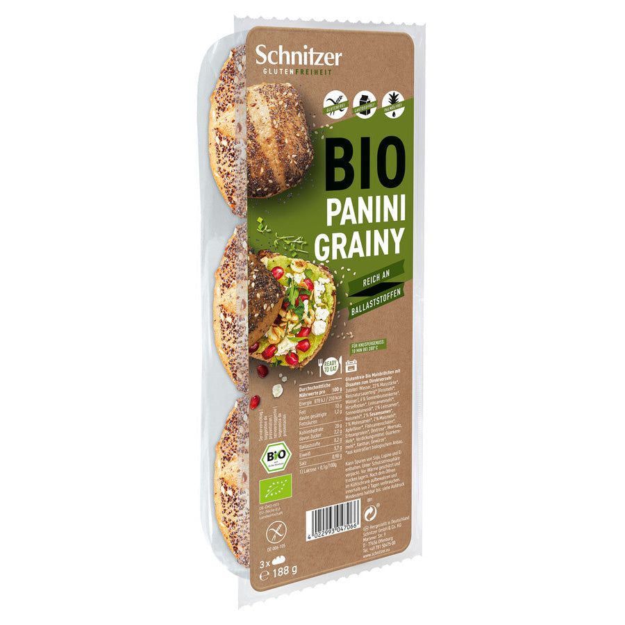 Verpackung mit drei glutenfreien Bio-Panini-Brötchen. Sichtbar sind Brötchenhälften mit Belag. Aufdrucke: "Schnitzer", "BIO", "Panini Grainy".