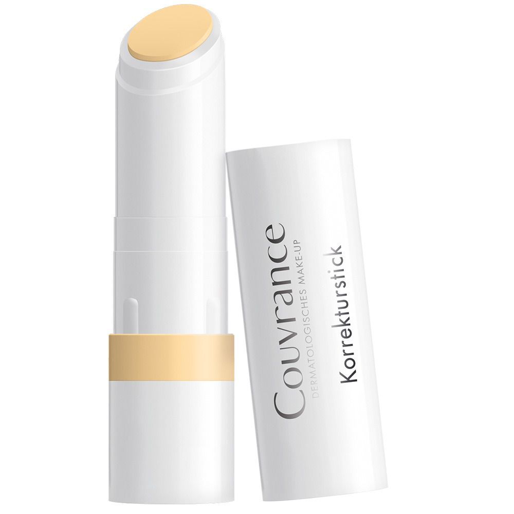 Stick correcteur jaune et étui blanc. Le nom "Couvrance" et "Korrekturstick" sont visibles sur l'étui.