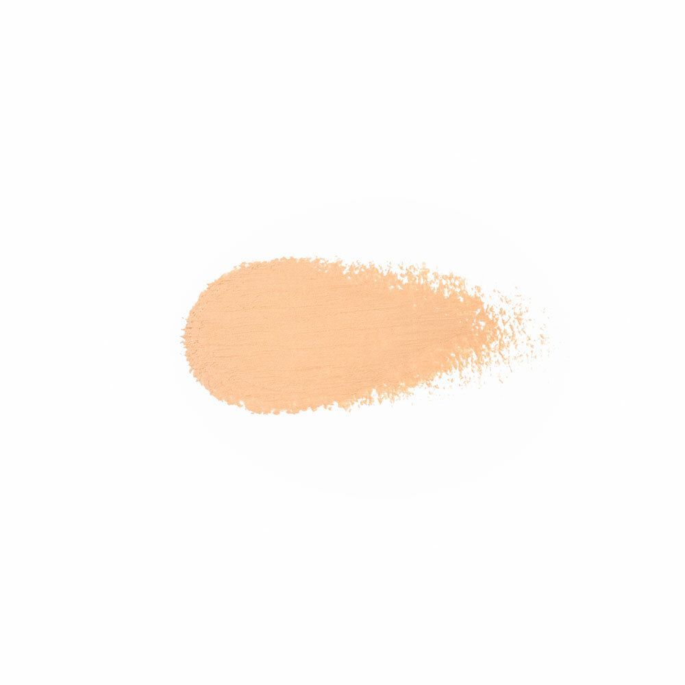 Échantillon de couleur beige sur fond blanc. Forme de coup de pinceau. Couleur beige clair.