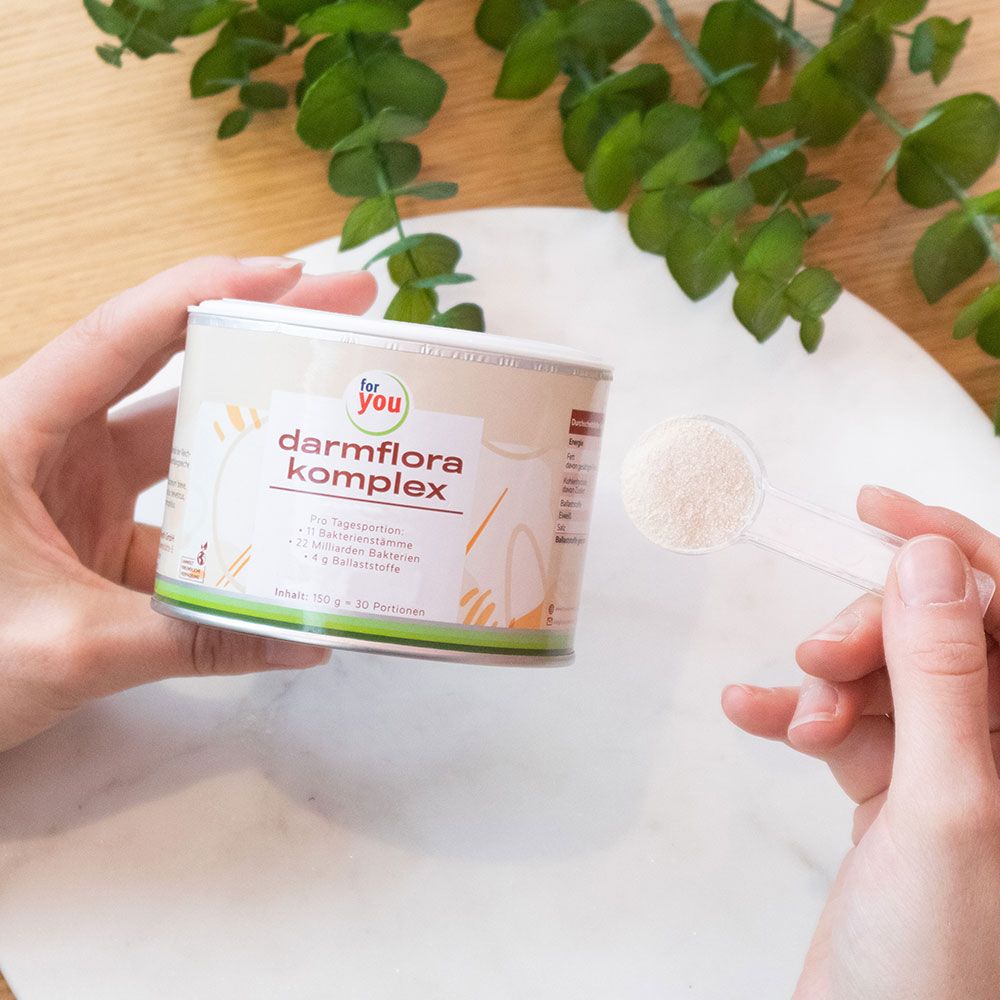 Dose "for you darmflora komplex" mit Dekoration. Aufschrift: 11 Bakterienstämme, 22 Milliarden Bakterien, 4 g Ballaststoffe. Inhalt: 150 g = 30 Portionen.