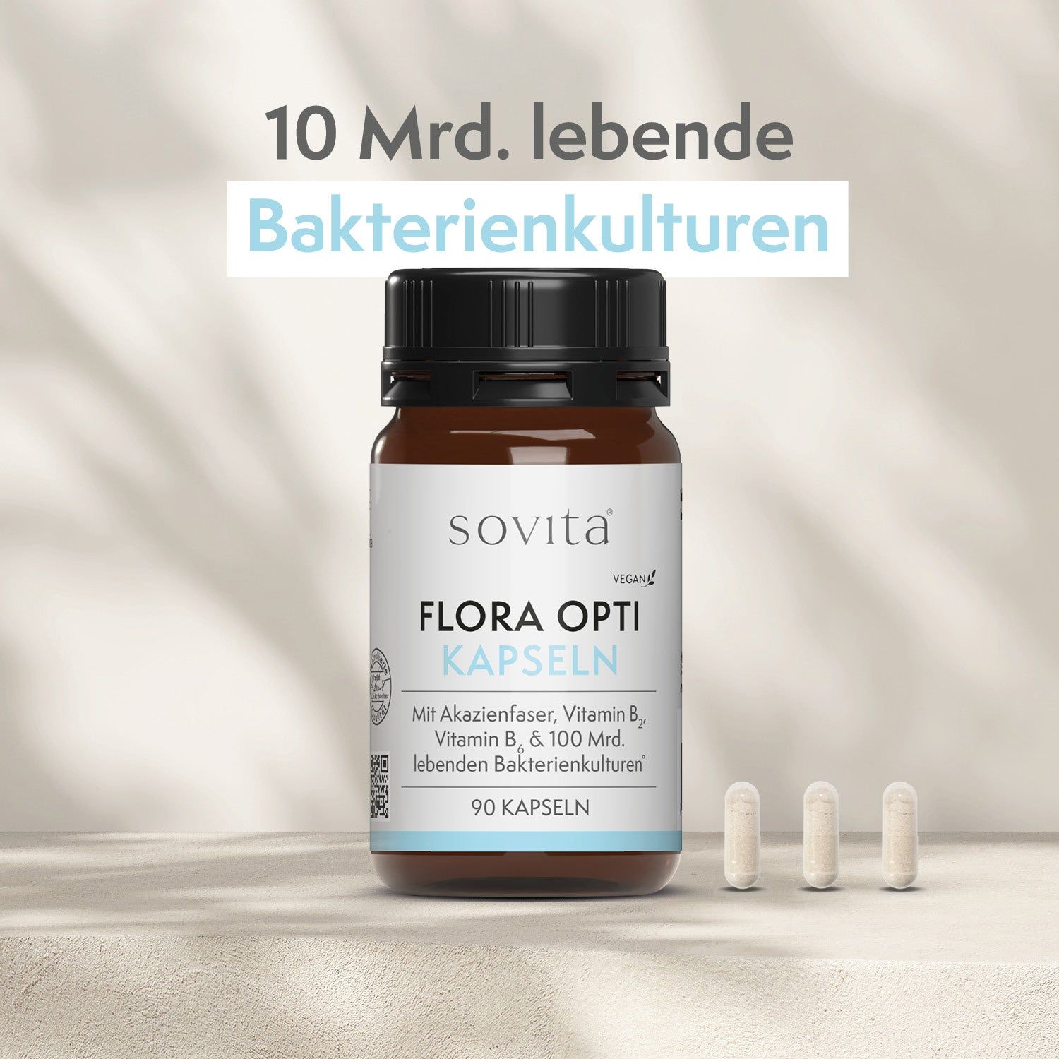 Braune Flasche mit Kapseln und 3 Kapseln daneben. Text: 10 Mrd. Bakterienkulturen, 90 Kapseln. Marke: sovita Flora Opti Kapseln.