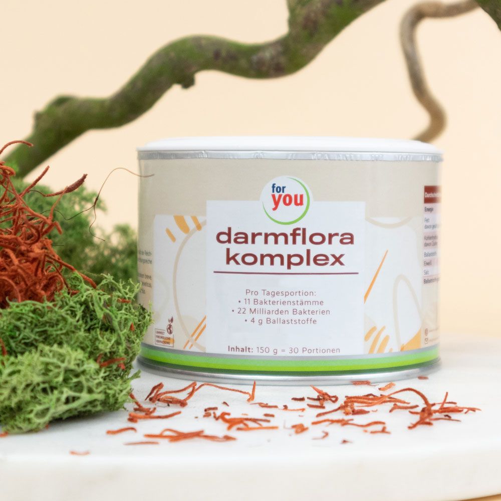 Dose "for you darmflora komplex" mit Symbolen. Aufschrift: 11 Bakterienstämme, 22 Milliarden Bakterien, 4 g Ballaststoffe. Inhalt: 150 g = 30 Portionen.