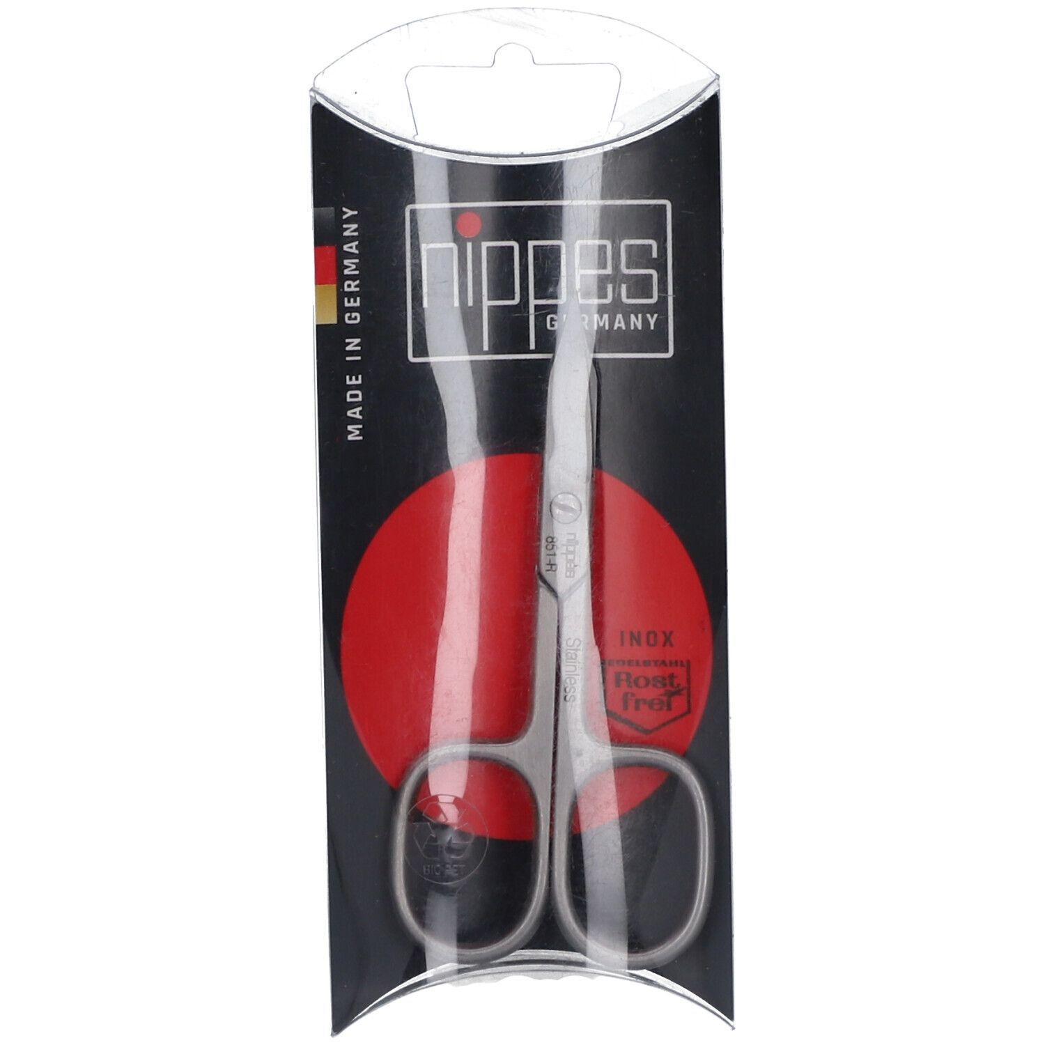 Ciseaux à ongles dans un emballage blister. Visible : marque nippes, Made in Germany. Cercle rouge. Ciseaux en acier inoxydable.