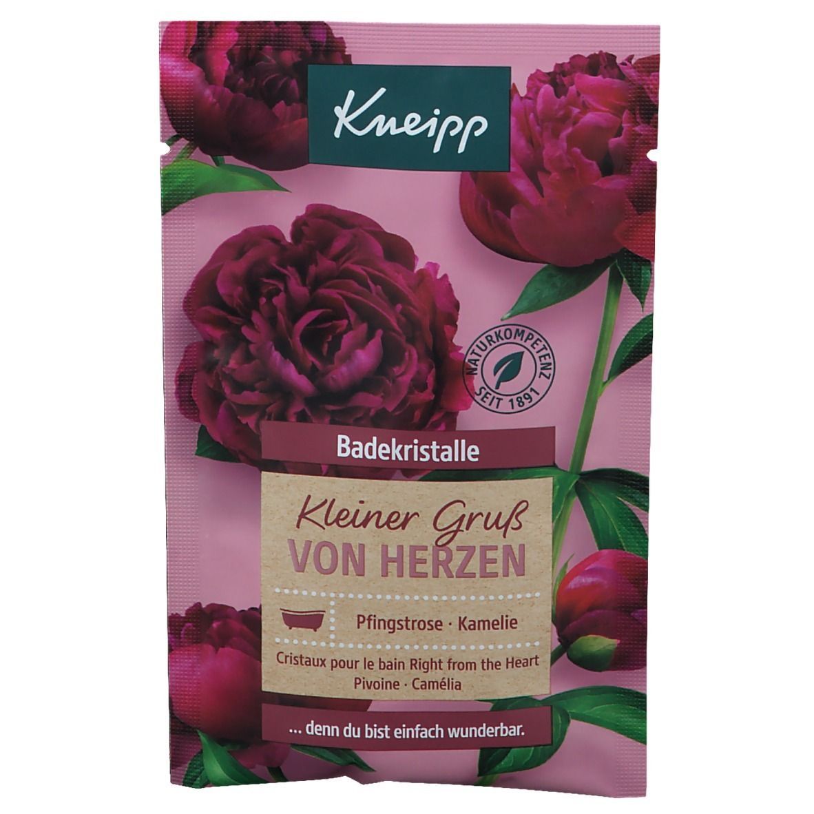 Sachet rose avec logo Kneipp et fleurs. Texte : Cristaux de bain, Petit cadeau du cœur. Contient pivoine et camélia. Label de compétence naturelle.