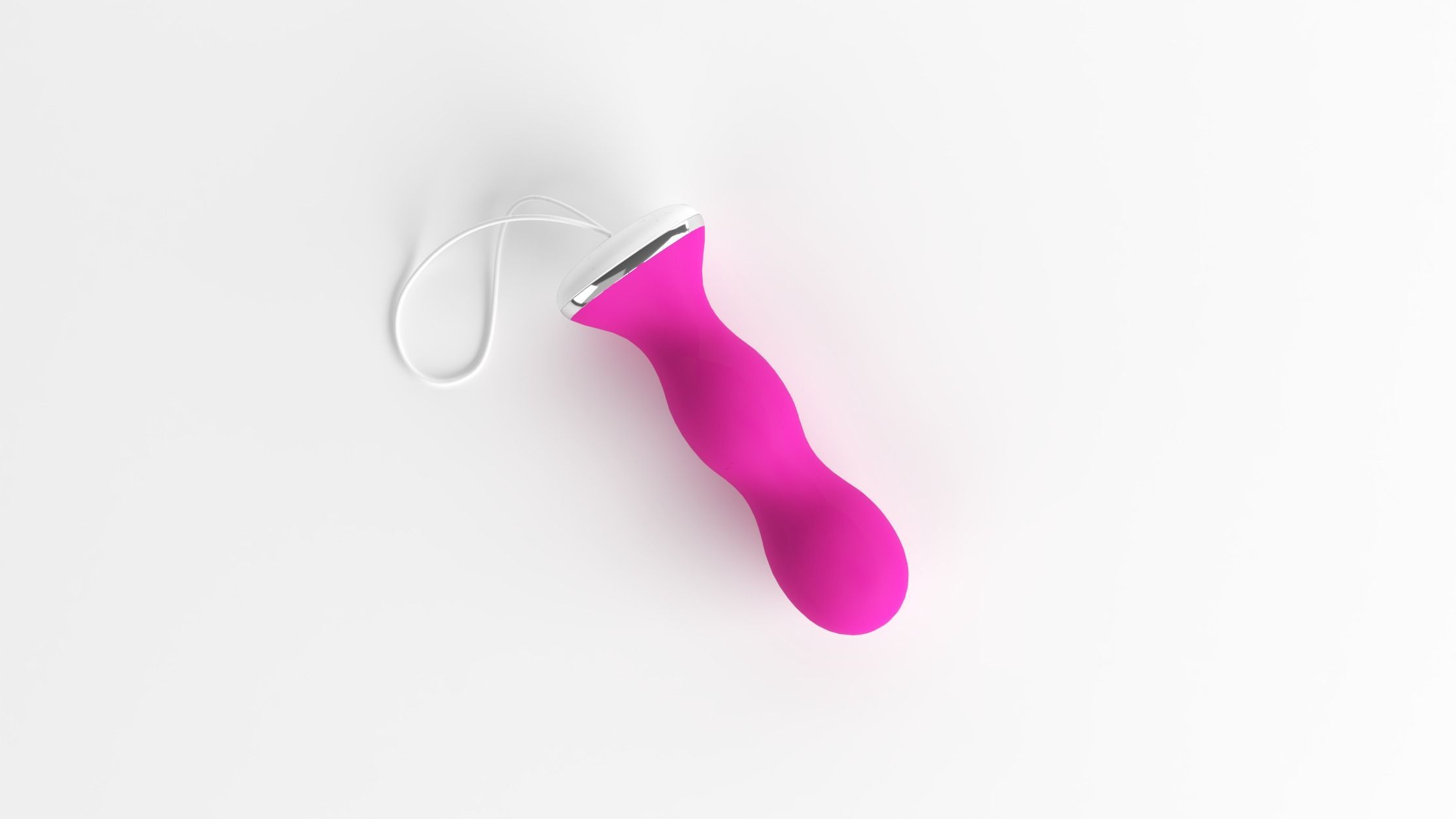 Pinkfarbener Beckenbodentrainer mit weißer Schlaufe. Produktansicht von oben auf weißem Hintergrund.